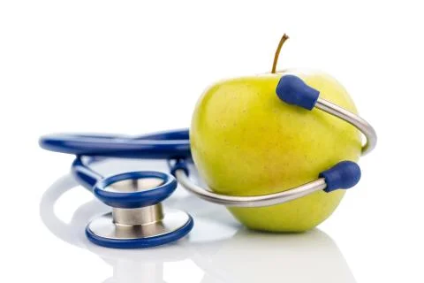 Apple and stethoscope Stock Photos