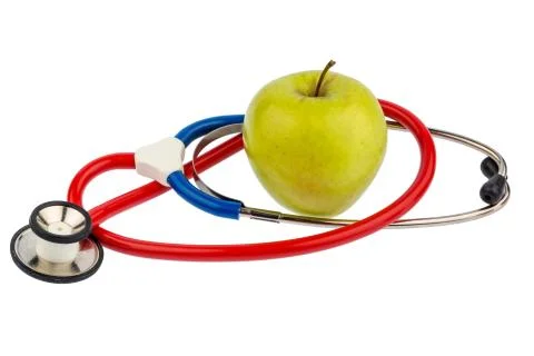 Apple and stethoscope Stock Photos