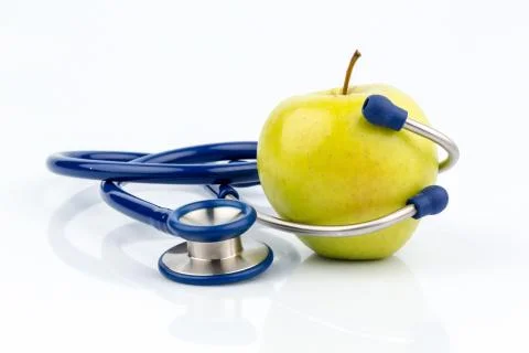 Apple and stethoscope Stock Photos
