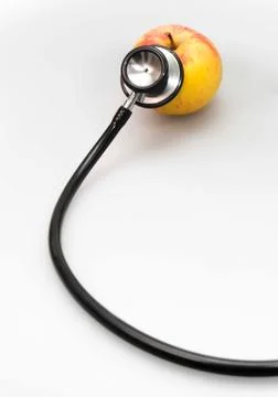 Apple and Stethoscope Stock Photos