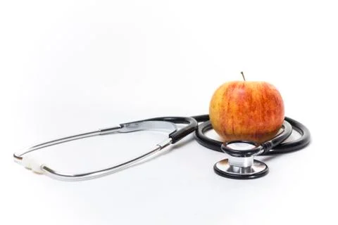 Apple and Stethoscope Stock Photos