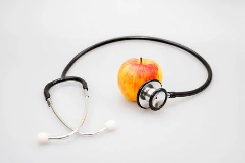 Apple and Stethoscope Stock Photos