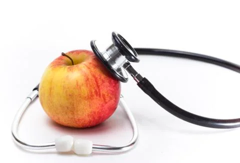 Apple and Stethoscope Stock Photos