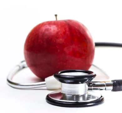 Apple and Stethoscope Stock Photos
