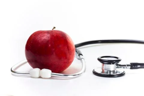 Apple and Stethoscope Stock Photos