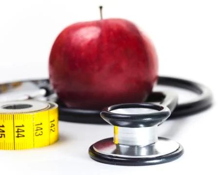 Apple and Stethoscope Stock Photos