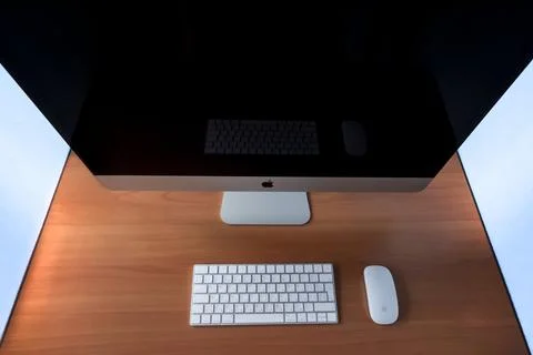 Apple appliances on the table Stock Photos