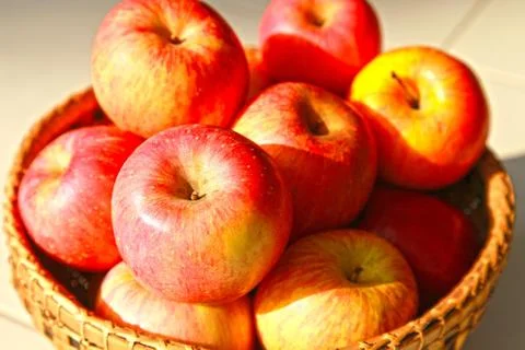 Apple in the basket Stock Photos