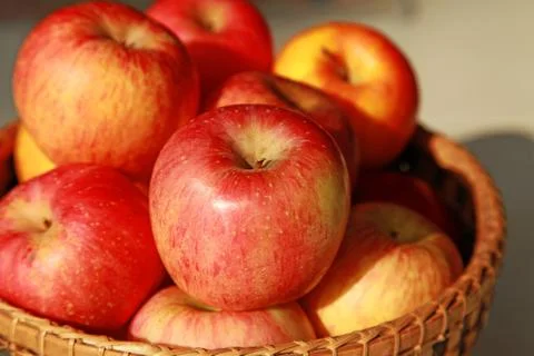Apple in the basket Stock Photos