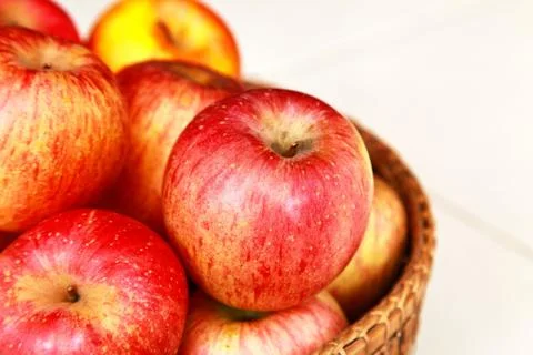 Apple in the basket Stock Photos