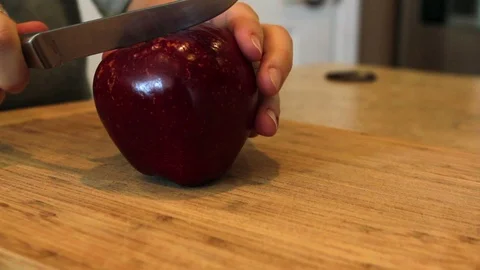 Apple Being Sliced On Top Of Cutting Board Colorado Video stock 100575439