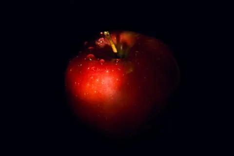 Apple on a black background Stock Photos