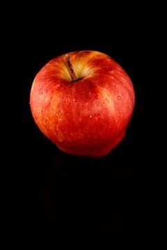 Apple in black background 스톡 사진