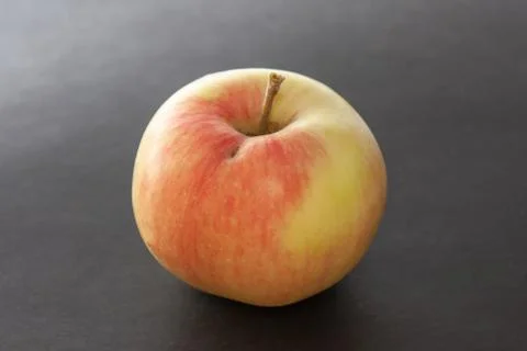 Apple on a black background Stock Photos