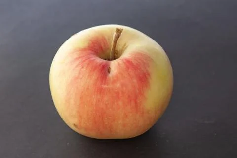 Apple on a black background Stock Photos