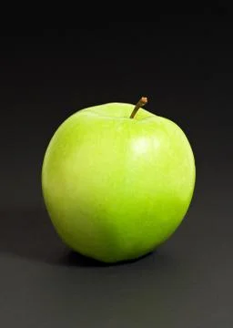 Apple on black Stock Photos