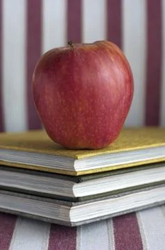 Apple with books Stock Photos