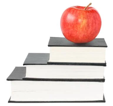 Apple with the books Stock Photos