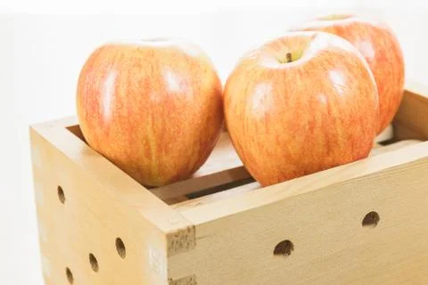 Apple in box Stock Photos