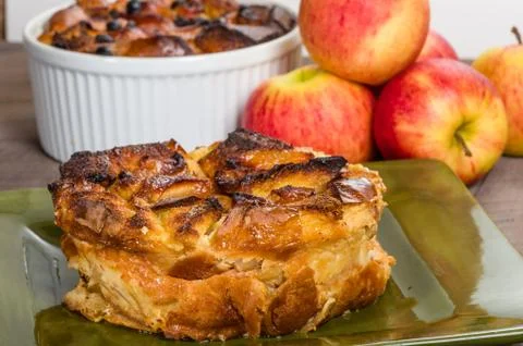Apple bread pudding with raisins Stock Photos