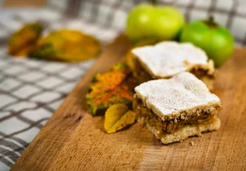 Apple cake with autumn background Stock Photos