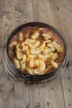Apple cake in a baking mold Stock Photos