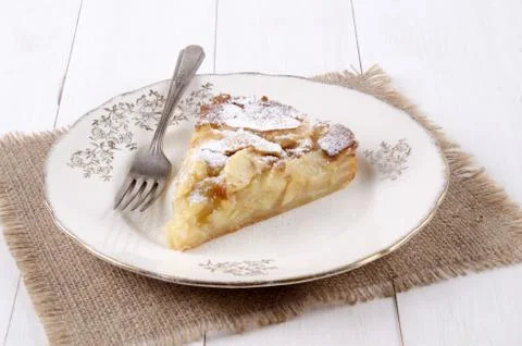 Apple cake with powdered sugar Stock Photos