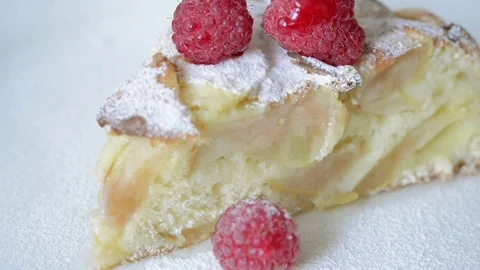 Apple cake with raspberry Stock Footage 80375091