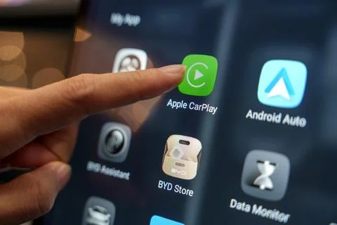 Apple CarPlay app on the digital display inside a BYD electric car Stock Photos
