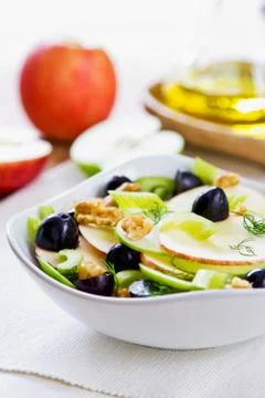 Apple with celery, grape and walnut salad Stock Photos