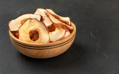 Apple chips in bowl Stock Photos