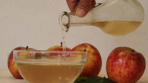 Apple cider vinegar stream falling Stock Footage 91238323
