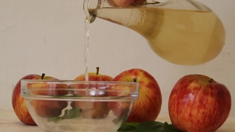 Apple cider vinegar stream falling Stock Footage 91238361