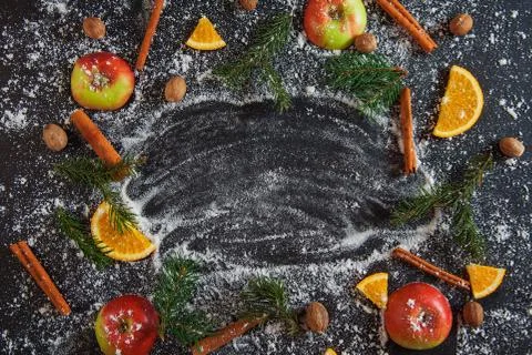 Apple cinamon nutmeg orange snow green fir branches new year Фото