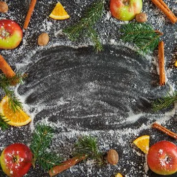 Apple cinamon nutmeg orange snow green fir branches new year Stockfoto's