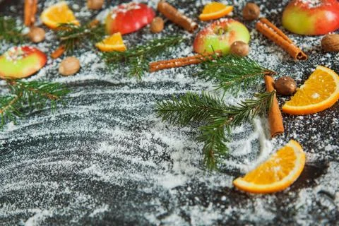 Apple cinamon nutmeg orange snow green fir branches new year Stockfoto's
