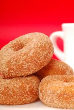 Apple cinnamon doughnuts with coffee Stock Photos