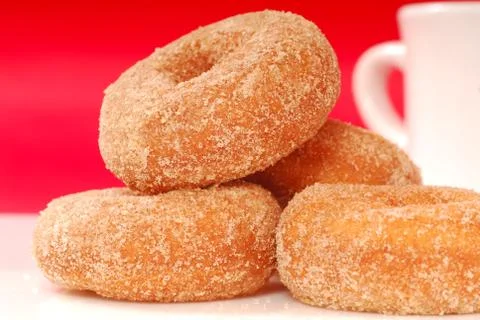 Apple cinnamon doughnuts with coffee Stock Photos