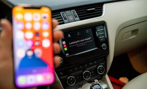 Apple Computers CarPlay from iOS iphone device inside car dashboard Stock Photos