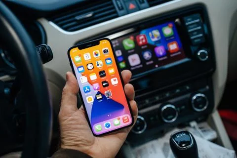 Apple Computers CarPlay from iOS iphone device inside car dashboard Stock Photos