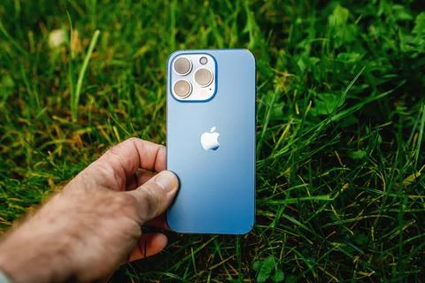 Apple Computers iPhone 13 pro with all three rear cameras and lidar sensor in Stock Photos