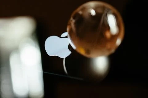 Apple Computers logotype logo loading bar next to glass globe 스톡 사진
