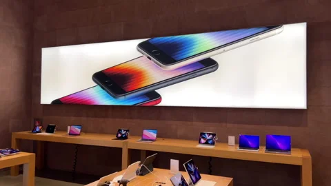 Apple Computers Store interior with multiple iPad's tablet, Mini Pro Air and Stock Footage 202171144