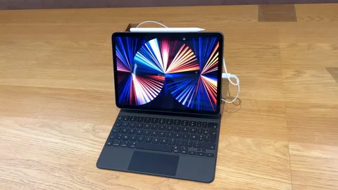 Apple Computers Store interior with one iPad tablet, Mini Pro Air and latest Stock Footage 202171170