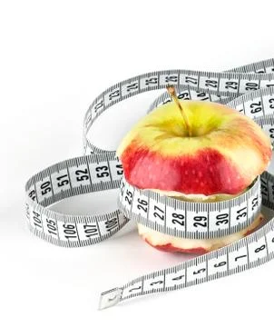 Apple core with meter Stock Photos