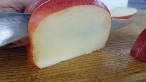 Apple cut with a knife slow motion Stock Footage 95579916
