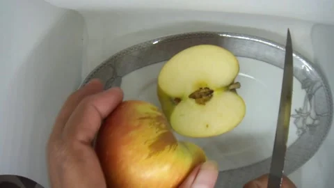 Apple cutting with sharp knife, HD Stock Footage 165154391