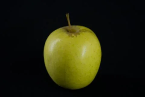An apple on a dark background Stock Photos