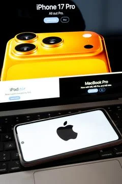 Apple devices showcasing new iphone and macbook pro models 写真素材