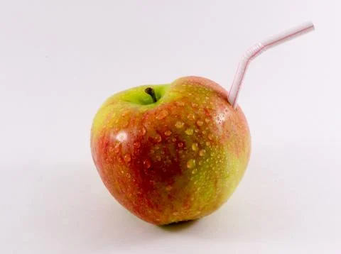 A Apple Drink Straw. Stock Photos